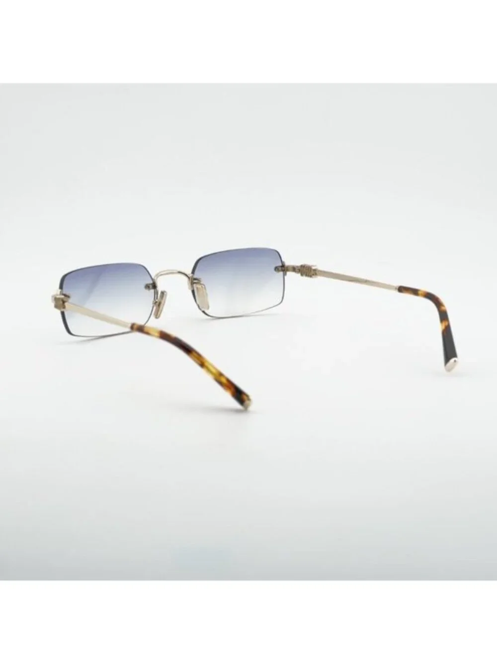 Miu Miu MUB50S ZVN80O Sunglasses Gold Rectangle Frame, Light Blue Lenses